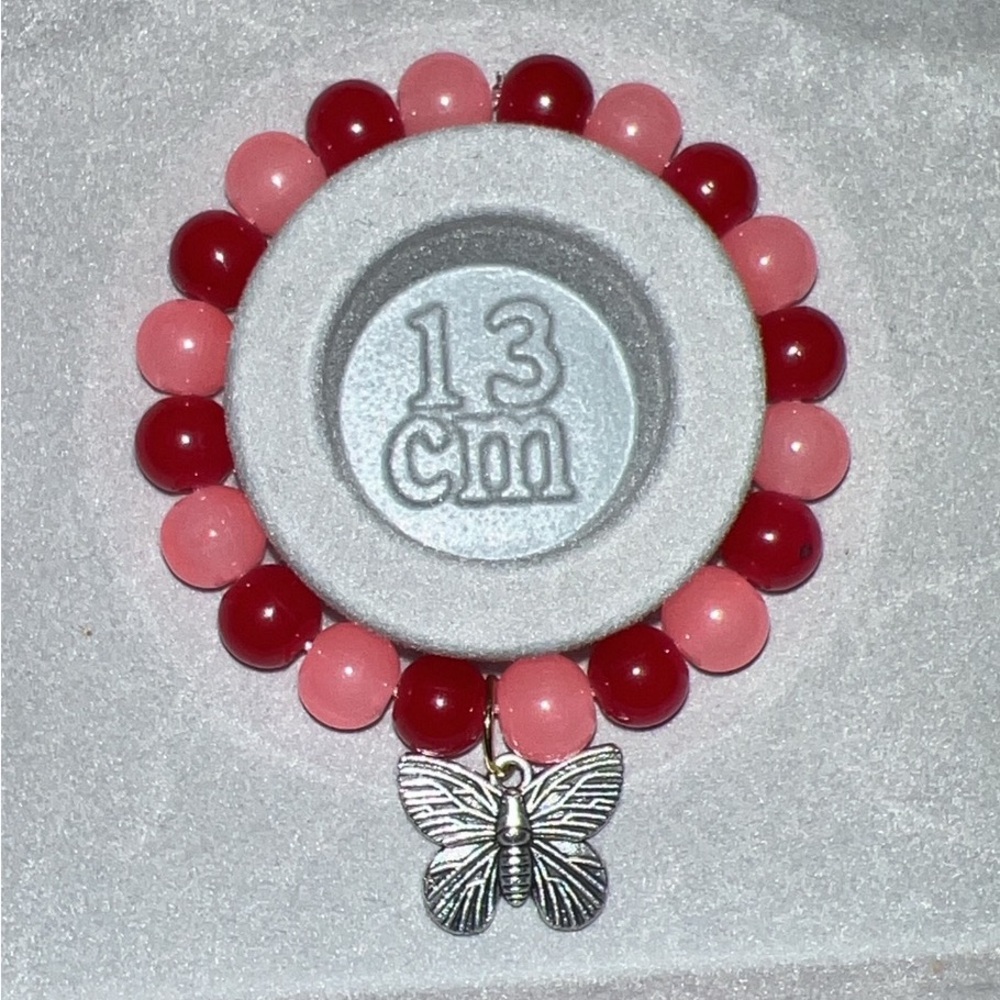 Pink and Red Beaded Bracelet with Butterfly Charm